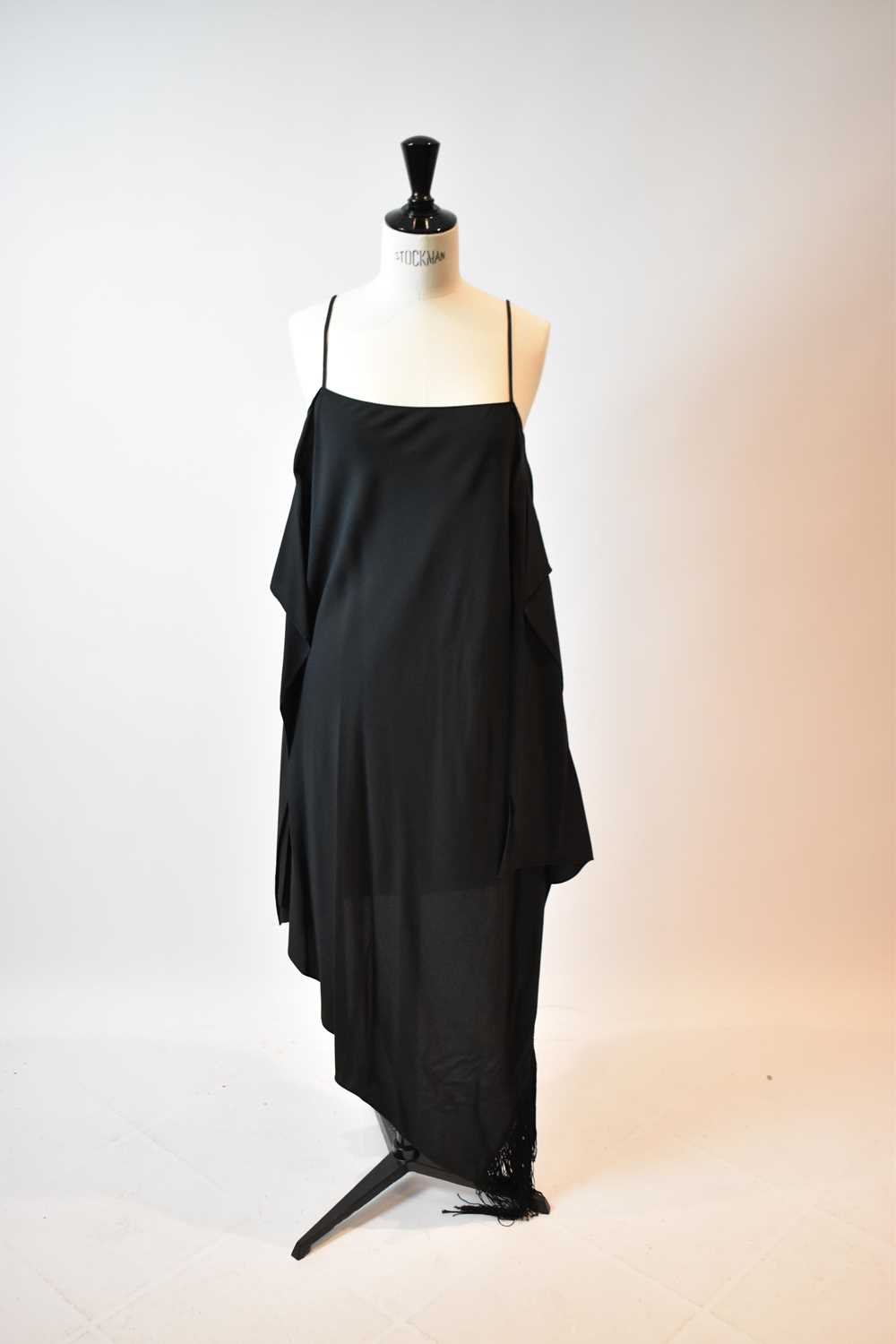 BALENCIAGA; a black wool A-symmetrical dress with spaghetti straps and matching cape, both with - Image 2 of 4