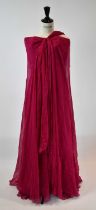 GUCCI; a fuscia pink 100% silk full length strapless evening dress, size 42. Condition Report:
