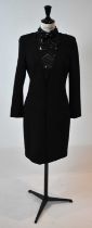 EMILIO PUCCI; a black 100% wool cocktail dress with beads and sequins, size small.