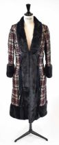 LOUIS VUITTON; a navy blue, red and cream tweed full length coat, trimmed with blue mink, size 38.