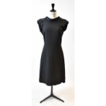 LOUIS VUITTON; a black wool and silk sleeveless cocktail dress with V-back, size 38.
