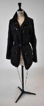 LOUIS VUITTON; a black belted jacket, size 34.