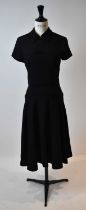 YVES ST LAURENT; a black wool crepe short sleeve dress, size small.