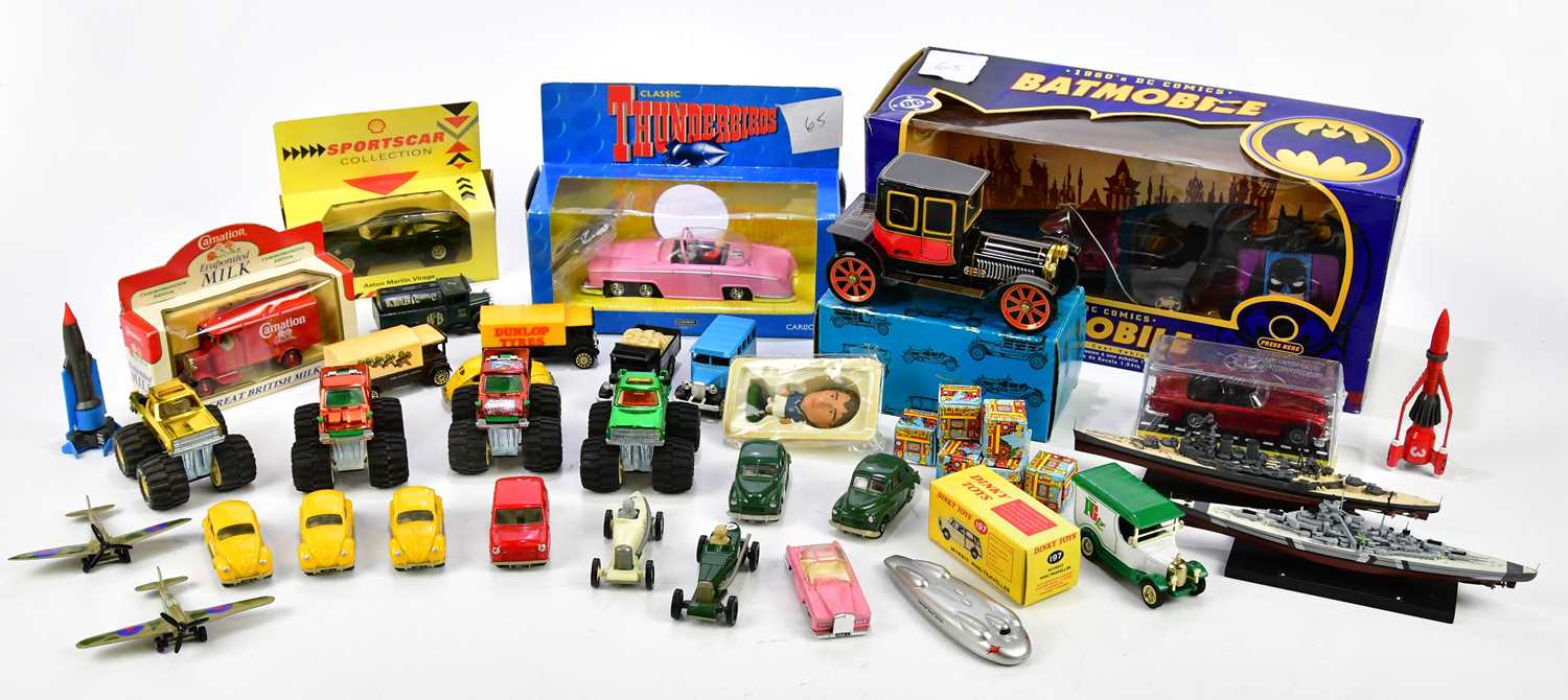 A small quantity of toys to include a Corgi Batmobile, a Corgi Thunderbirds car, a boxed tinplate