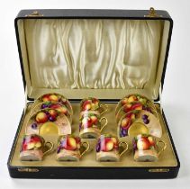 ROYAL WORCESTER; a cased set of six fruit painted coffee cups with saucers, the majority signed