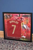 CRISTIANO RONALDO; a signed Manchester United football shirt, 85 x 83cm, framed and glazed.