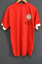 SIR BOBBY CHARLTON; an England World Cup Winners retro-style football shirt, signed to the front,