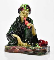 ROYAL DOULTON; HN1317, 'The Snake Charmer', a rare example dated 2.5.28, a year before production