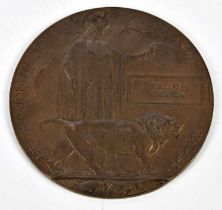 A WWI bronze memorial plaque awarded to William Greener.