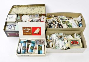 A large collection of various cigarette cards, to include Woodland Wildlife, Olympic Greats,