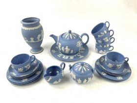 WEDGWOOD; a jasperware tea set to include cups, saucers, a sugar bowl, a teapot, side plates, etc.