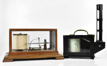 NEGRETTI & ZAMBRA; a black metal and brass barograph and an oak cased barograph, width 37cm (2).