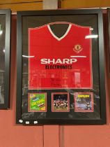 BRYAN ROBSON; a signed replica Manchester United shirt 1983 F.A cup final, framed with an image of