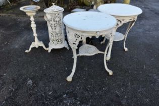 A group of white painted cast iron items including a pair of Britannia pub tables, etc (8).