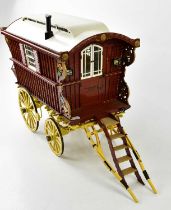 Three scratch built models, inlcuding two gypsy caravans, length of largest example 45cm (3)