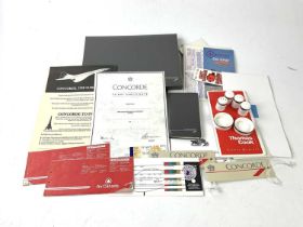 CONCORDE INTEREST; a folder containing assorted ephemera relating to Concorde and a Wedgwood British