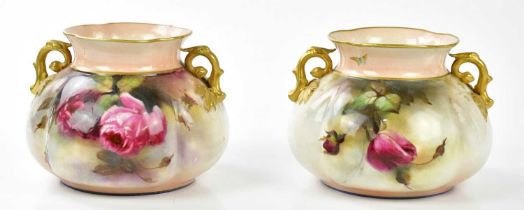 JOSEPH HADLEY, ROYAL WORCESTER; two twin handled bulbous form vases painted with roses, one