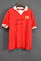 MANCHESTER UNITED; a signed 1970s Manchester United retro-style football shirt, signed to the