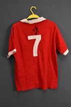 GEORGE BEST; a 1970s Manchester United retro-style football shirt, signed and inscribed to verso, '