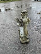 A reconstituted stone garden figure of a femaile embematic of Autumn, height 77cm.