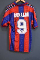 RONALDO; a signed Barcelona retro-style football shirt, signed to the reverse, size L. Condition