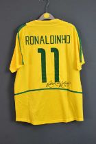 RONALDINHO; a Brazil 2002 retro-style football shirt, signed to the reverse, size L. Condition