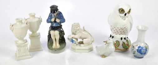 A mixed collection of ceramic figures to include a Crown Staffordshire snowy owl, a Royal Copenhagen