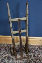 SLINGSBY; a vintage wooden framed trolley with iron mounts, height 110cm.