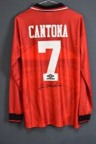 ERIC CANTONA; a 1994/96 Manchester United retro-style football shirt, signed to the reverse, size L.