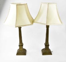 A pair of brass Corinthian column lamps, height including shade 69cm.