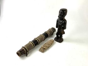 An African carved hardwood figure, height 30cm, a wicker and leather quiver holder, an unusual