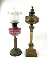 Two Victorian oil lamps to include a brass Corinthian column example with alabaster column, height