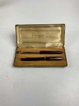 PARKER; a cased "57" fountain pen and a Sheaffer fountain pen (2).
