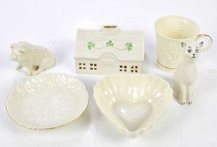 BELLEEK; a small collection of ceramics to include a pig, cat, cottage, heart shaped bowl and a