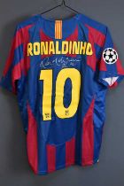 RONALDINHO; a signed Brazil 2005 retro-style football shirt, signed to reverse, size L. Condition