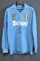 DIEGO MARADONA; a signed Napoli Buitoni retro-style football shirt, signed to the front. Condition