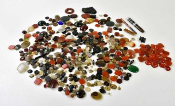 A collection of assorted hardstone and agate cabochons, roundels and parts.