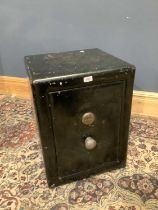 A very heavy Victorian cast iron safe, approx 61 x 50 x 47cm, with key.