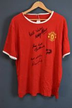 MANCHESTER UNITED; a 1960s retro-style football shirt, signed to the front by Stiles, Law, Best