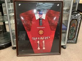 MANCHESTER UNITED INTEREST; an autographed replica Theatre of Dreams jersey, signed by George Best