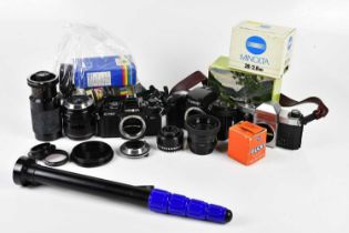 A mixed collection of cameras and photography equipment, to include Canon EOS100, two pairs of