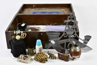 A Victorian workbox containing an assortment of collectors' items, including hat pins, draftsman's