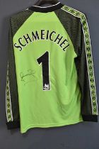 PETER SCHMEICHEL; a Manchester United Treble Winners goalkeepers retro-style football shirt,