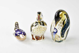 ROYAL CROWN DERBY; three animal form paperweights comprising puffin, penguins and bird (3).