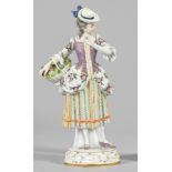 Seltene Figur "Dame mit Blumenkorb"