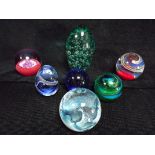 7 x Coloured Glass Paperweights. Two are marked 'CHG' incised into glass base(Channel Islands