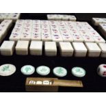 Chinese Mah-Jongg (Mahjong) Bone and Wooden Game Tokens in Metal Box. Appears complete. Remnants of