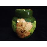 GB William Moorcroft Ginger Jar. 20th Century. Hibiscus Pattern, shape number 769. Decorated with