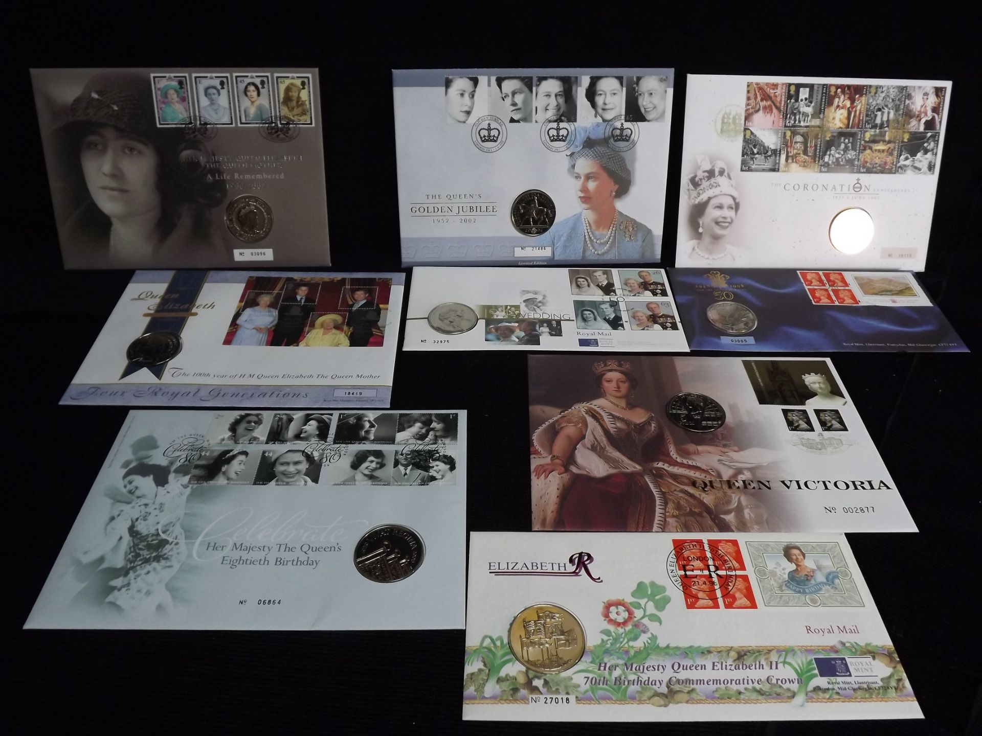 8 x GB Royal Mint Uncirculated £5 Anniversary Coins. Queen Elizabeth II in 8 x Royal Mail Stamp Sets