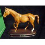 GB Royal Doulton chestnut colour ceramic Horse on a wooden stand. Model DA193 'My First Horse'.